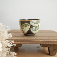 Cool Banana Black Pottery with Gold Detailing Tea Cup