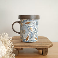 Cool Banana Black Pottery with Gold Detailing Blue Flower Tall Mug with Lid