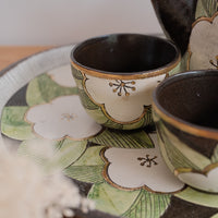 Cool Banana Black Pottery with Gold Detailing Tea Cup